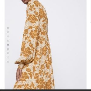 Zara long sleeve open back midi dress. New with tags never worn size small.